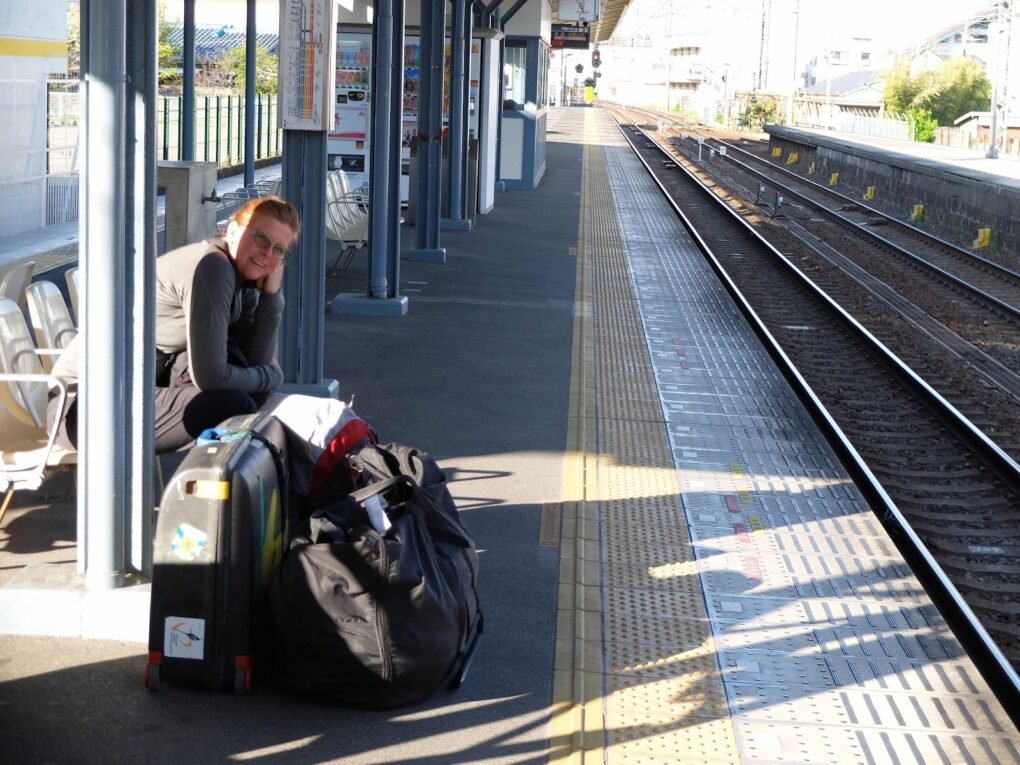 Waiting for the train with my bike in its suitcase.